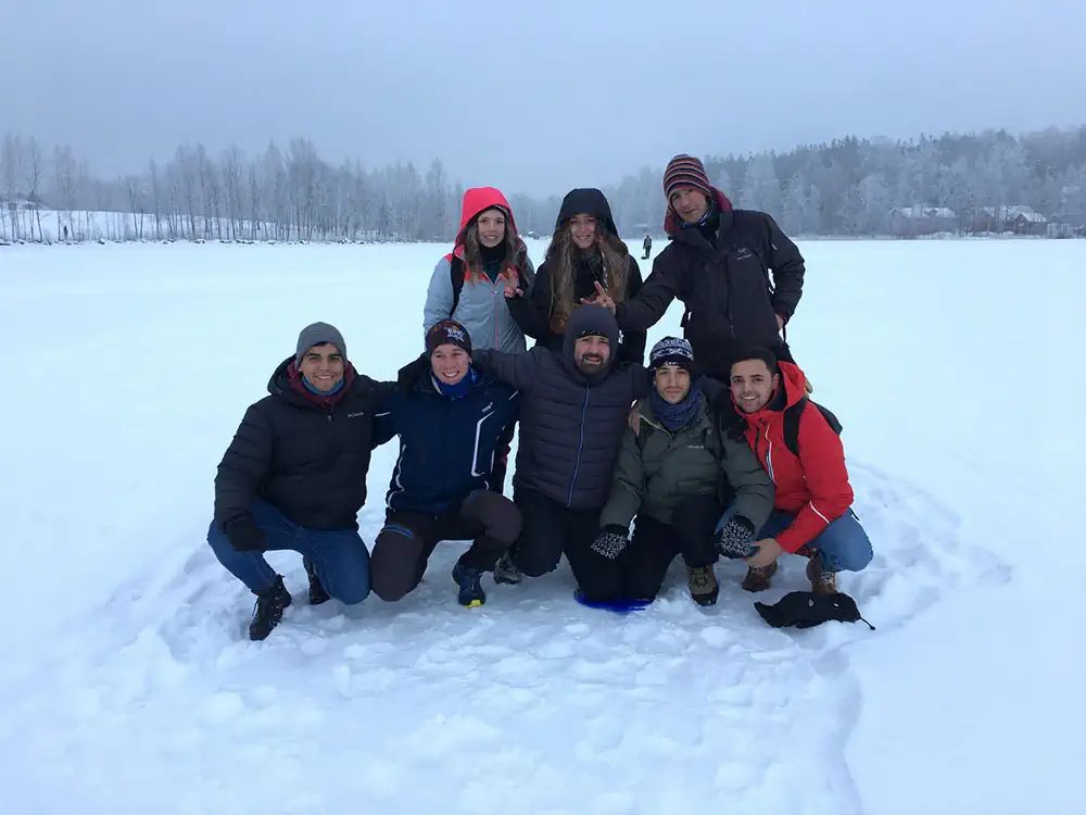group photo in a snowy meadow