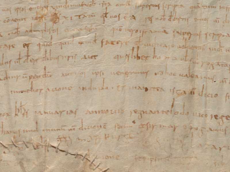 Detall del pergamí on es detalla la venda de dos trossos de terra a Mont Euseubi per part del matrimoni format per Dominicus i Riceldis